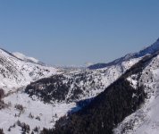 zoom_sul_passo_tonale_e_in_lontananza_il_sassolungo_e_le_dolomiti_437.jpg