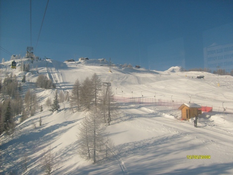 49718-la-thuile-11022010-arrivo-a-les-suches-con-pista-blu-piloni.jpg