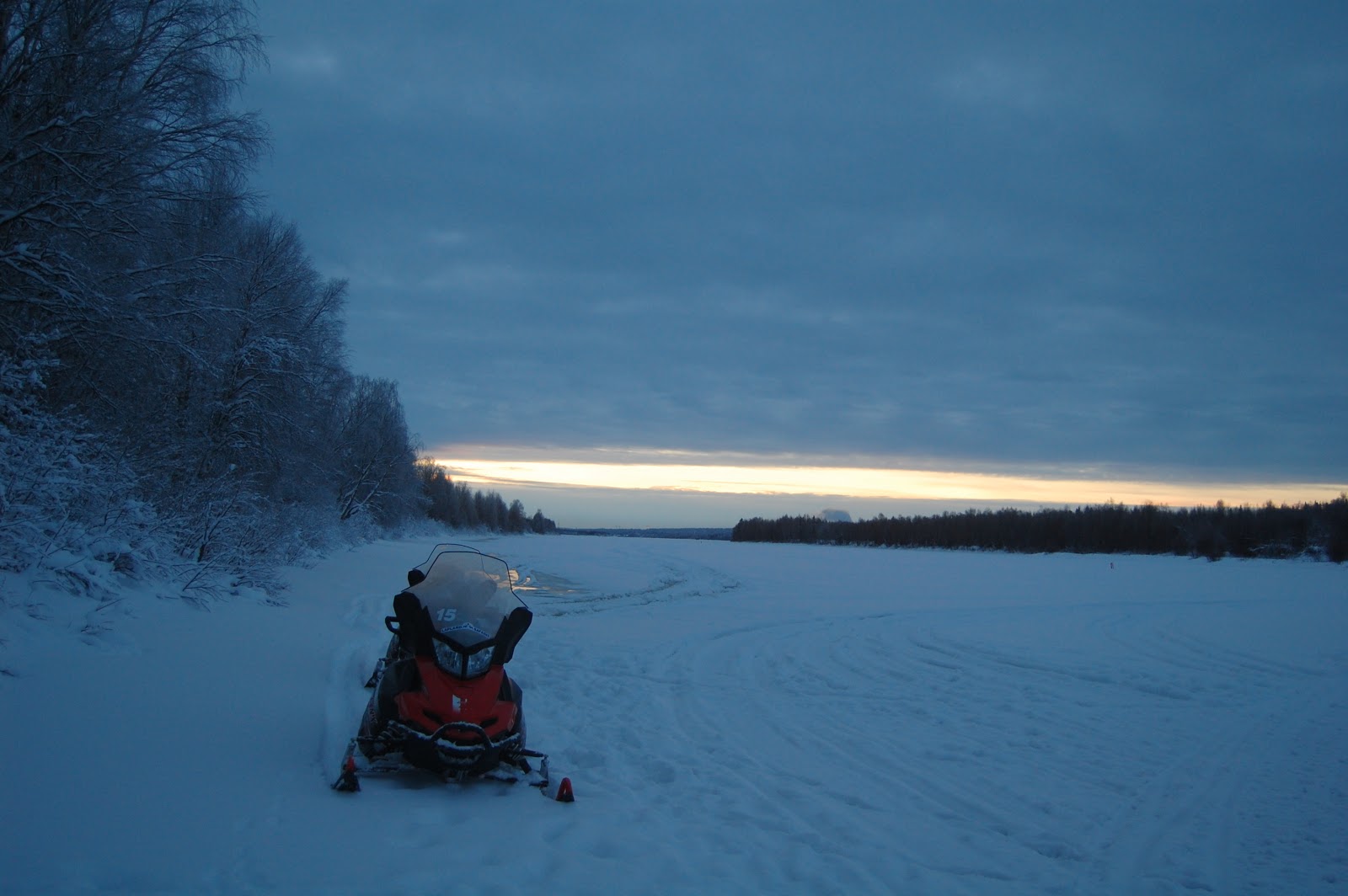 124030-rovaniemi-contrasti-motoslitta-fiume-originale.jpg